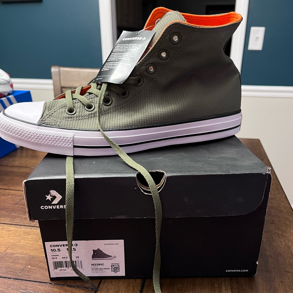 Converse Chuck Taylor All-Star size 10.5. Olive and orange. NWT in box.